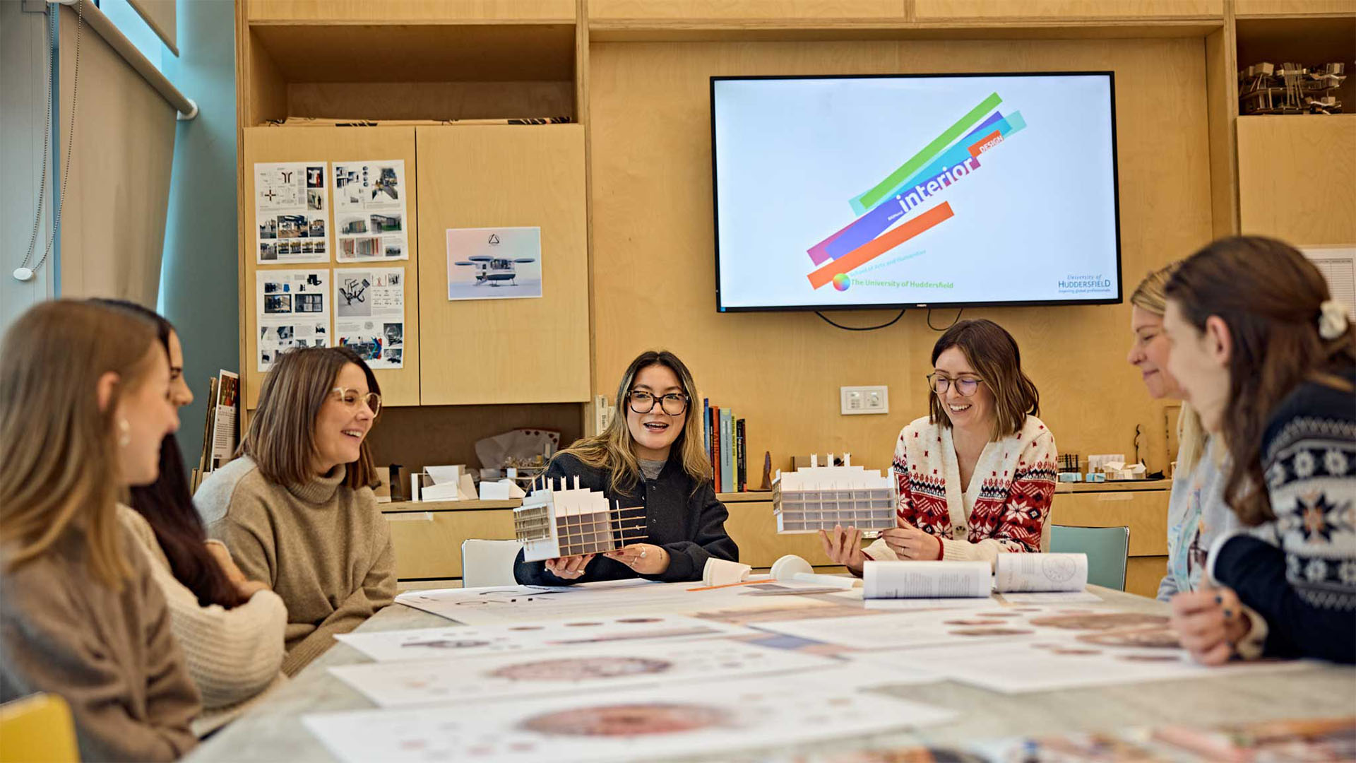 Students speaking at an interior design workshop in Barbara Hepworth
