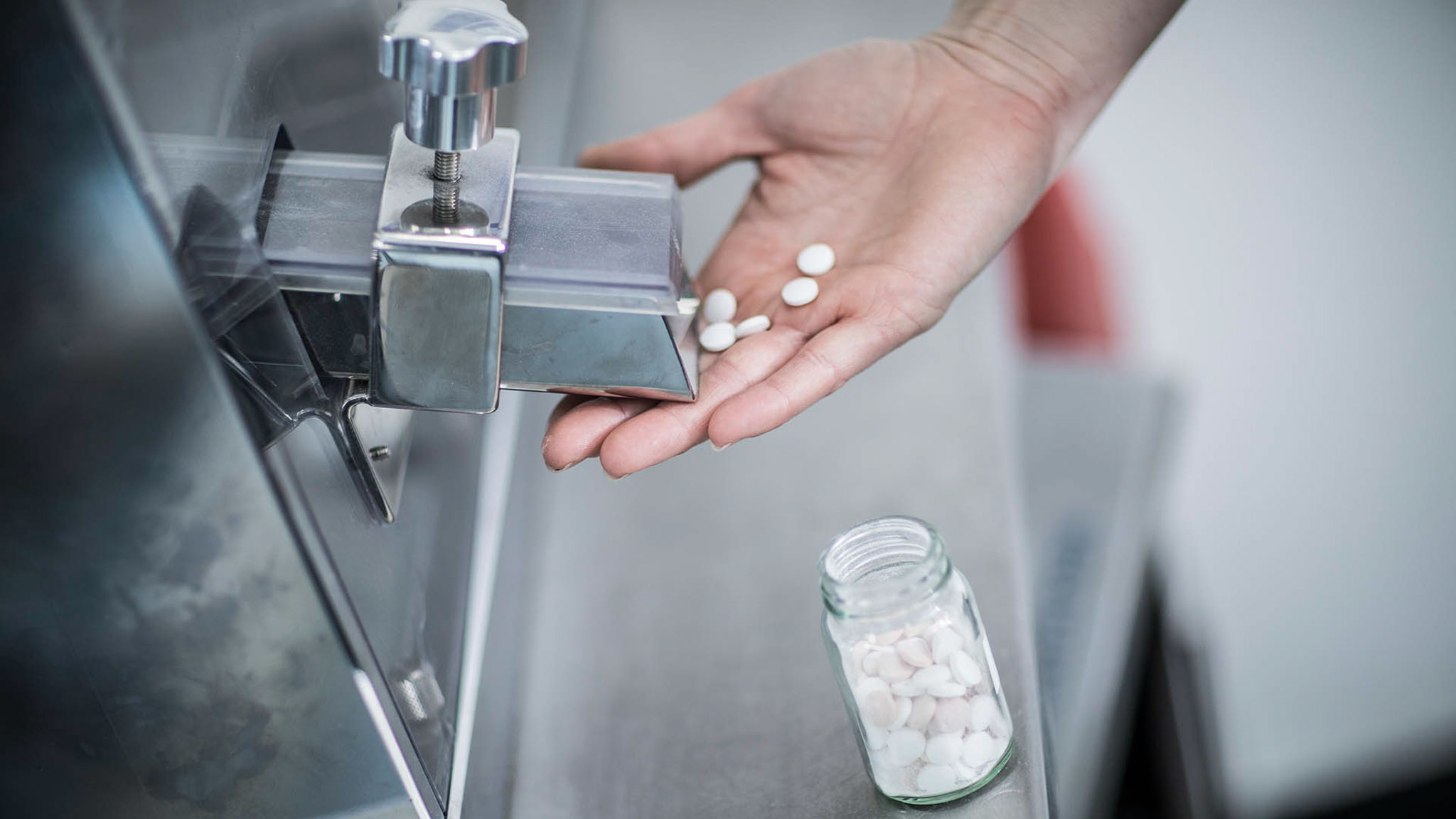 Image of someone dispensing medication