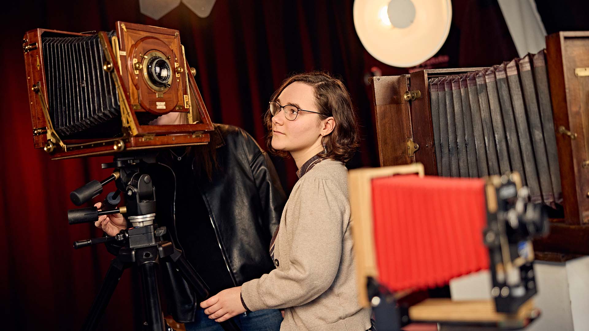 Photography student using a Vintage Camera