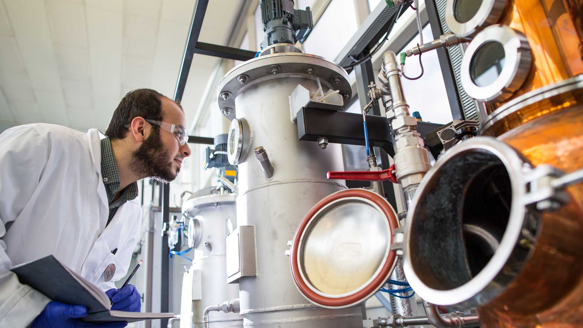 Chemical Engineering student using equipment